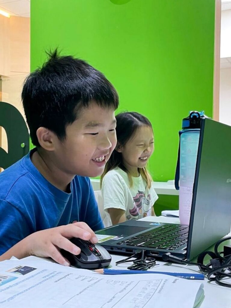 Image of boy coding - enrichment class singapore