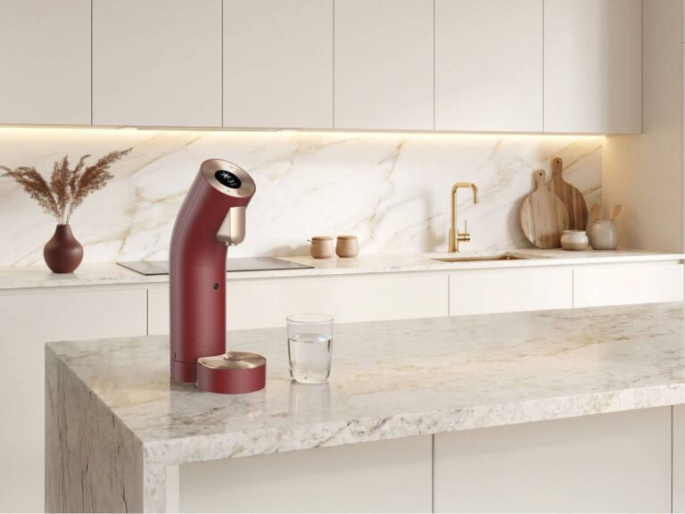 Wells The One water purifier and Wells Home Café tea and coffee appliance in a modern Singapore kitchen
