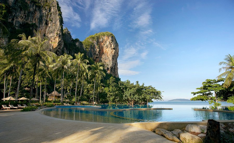 Infinity pool below limestone cliffs at Rayavadee on Railay, Krabi, looking out to the Andaman Sea