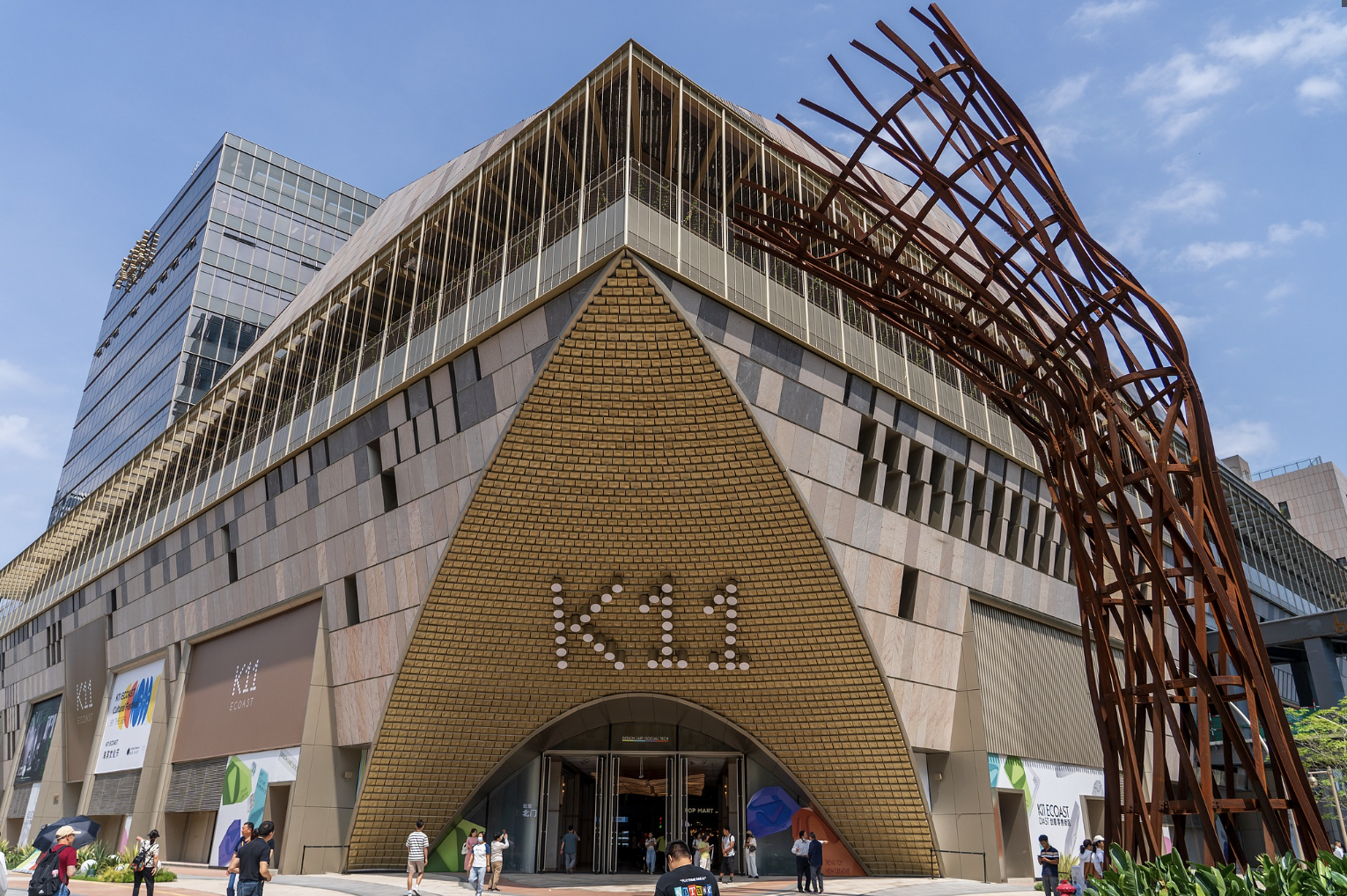 The K11 ECOAST mall entrance in Shekou, Shenzhen, with its giant K11 facade and rust-red outdoor art sculpture