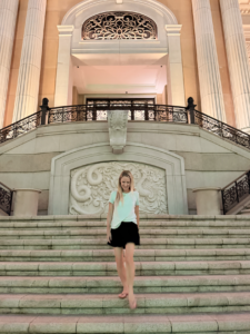 Image of Shea doing a review of Grand Lisboa Palace Hotel in Macao